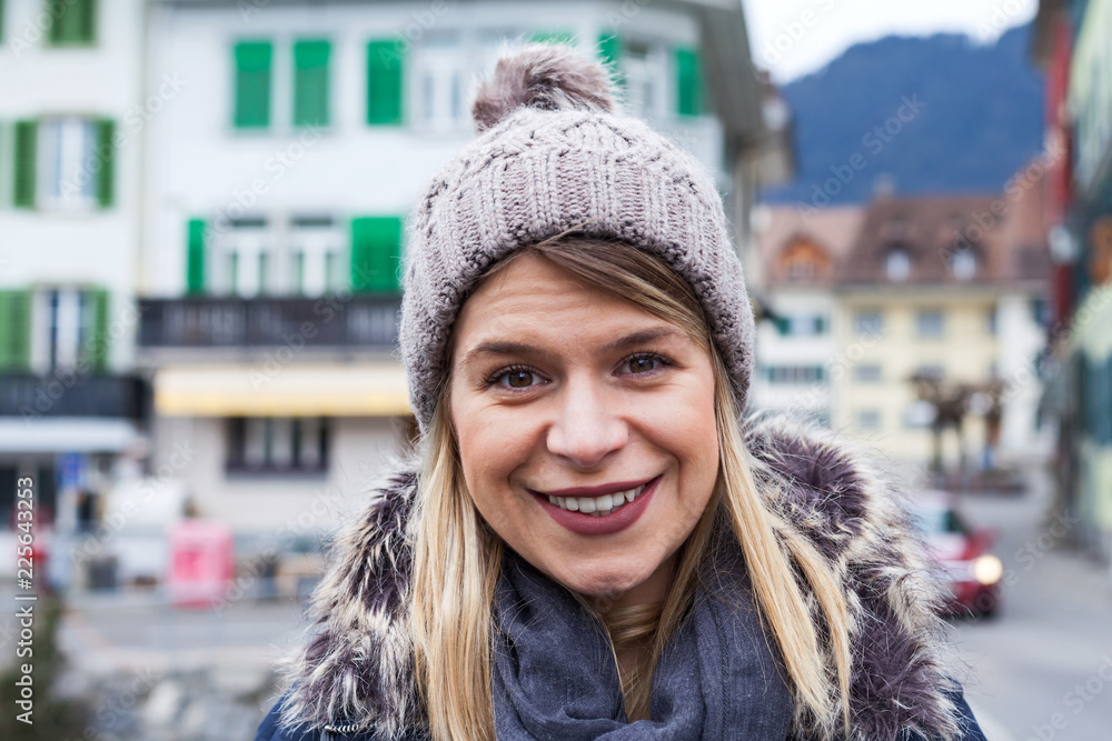 Smiling tourist in Interlaken, Switzerland Smiling tourist in Interlaken, Switzerland