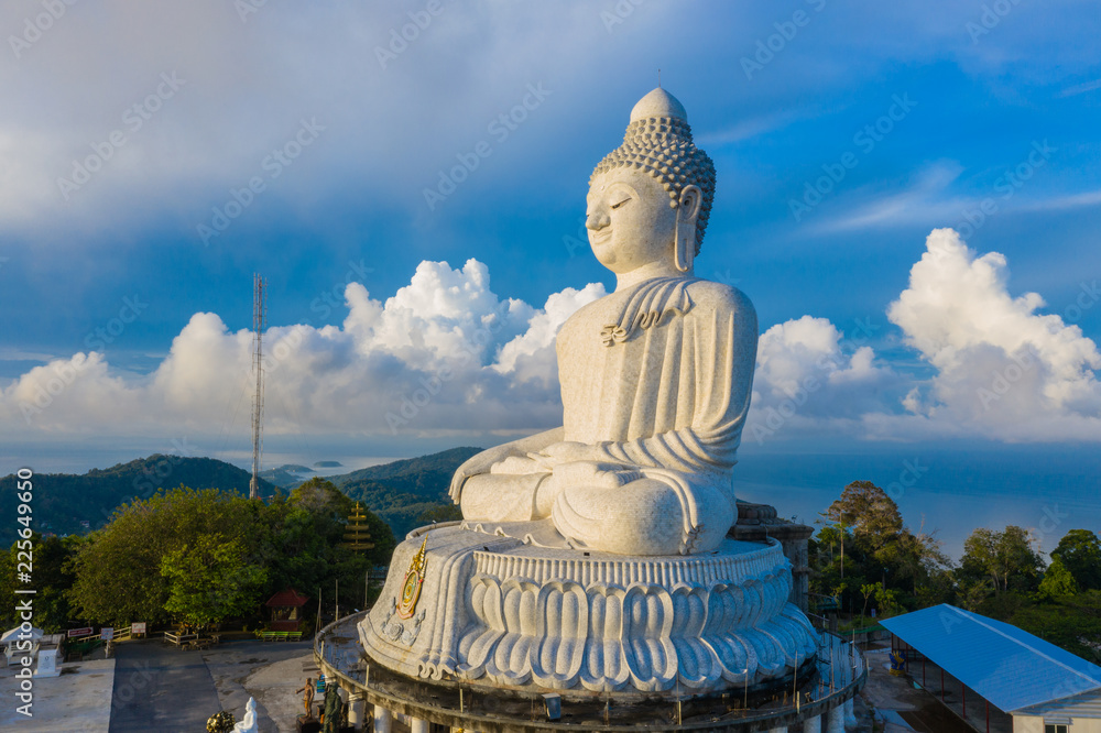 Obraz premium aerial photography scenery blue sky and blue ocean behind Phuket white big Buddha. Phuket white big Buddha is the .famous landmark in Phuket island a lot of tourists visiting this landmark every day