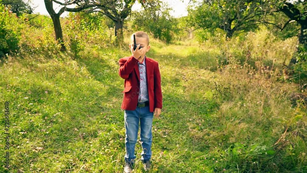 boy with a walkie-talk in nature boy with a walkie-talk in nature