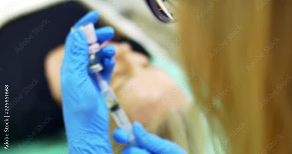 Doctor prepare syringe with a medicine Doctor prepare syringe with a medicine
