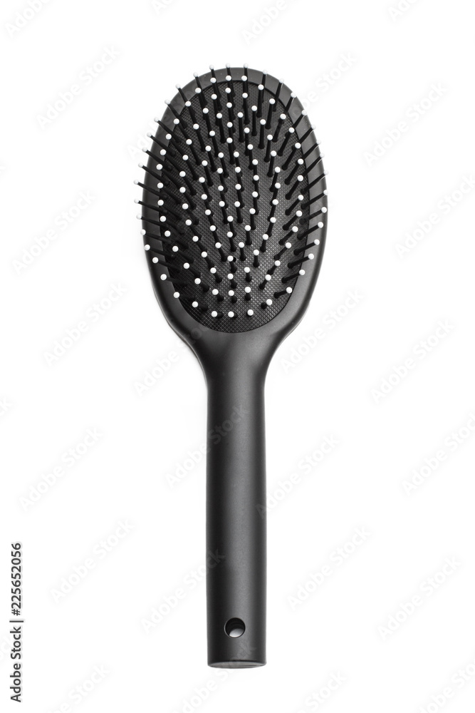 Cepillo negro de plástico para el pelo sobre fondo blanco aislado. Vista superior Cepillo negro de plástico para el pelo sobre fondo blanco aislado. Vista superior