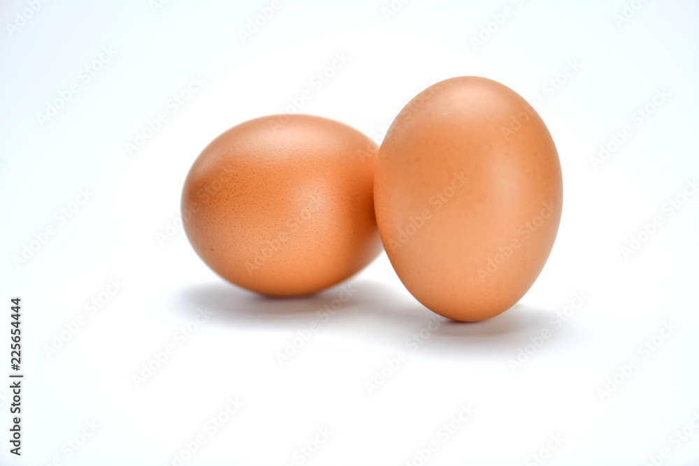 Two eggs are isolated on a white background. Two eggs are isolated on a white background.