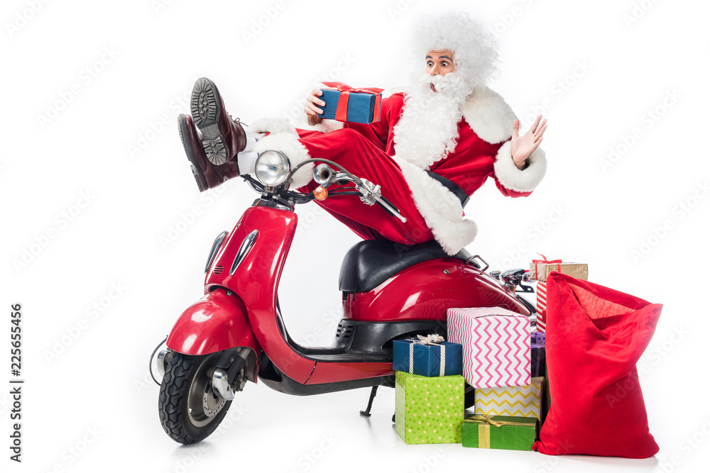 shocked santa claus in costume sitting on scooter with christmas present  isolated on white background foto de Stock | Adobe Stock