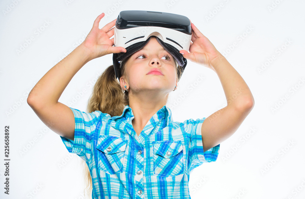 Child play virtual games with modern device. Explore virtual opportunity. Newest kids virtual reality games. Virtual reality is fun for all ages. Kid girl with vr glasses. Little gamer concept Child play virtual games with modern device. Explore virtual opportunity. Newest kids virtual reality games. Virtual reality is fun for all ages. Kid girl with vr glasses. Little gamer concept