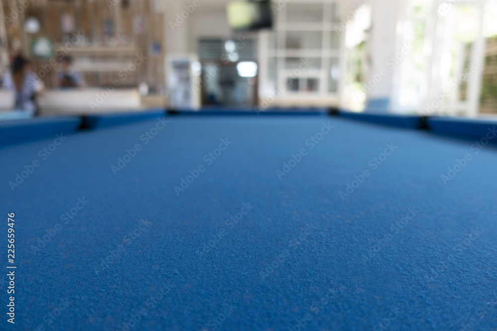 Blue Billiard, Pool tables with soft focus background
