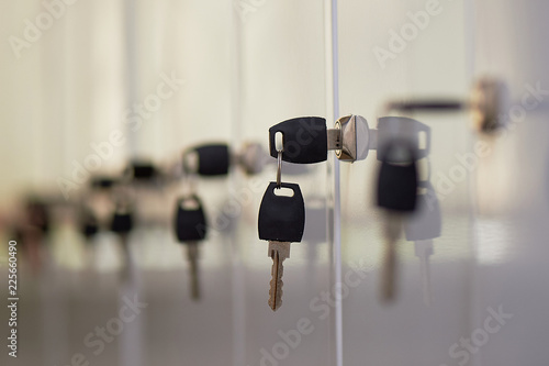 The key in the locker. There are a lot of lockers, a locker room in a fitness club, a medical center, an office, a post office or a Bank.