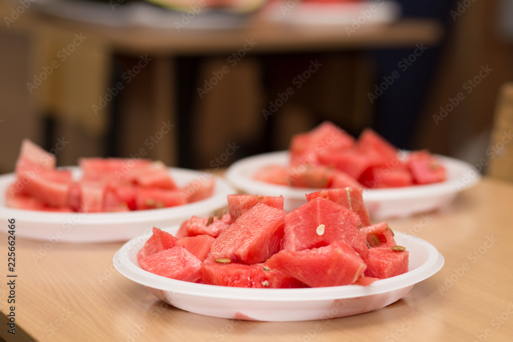 watermelon pieces on a wooden board watermelon pieces on a wooden board