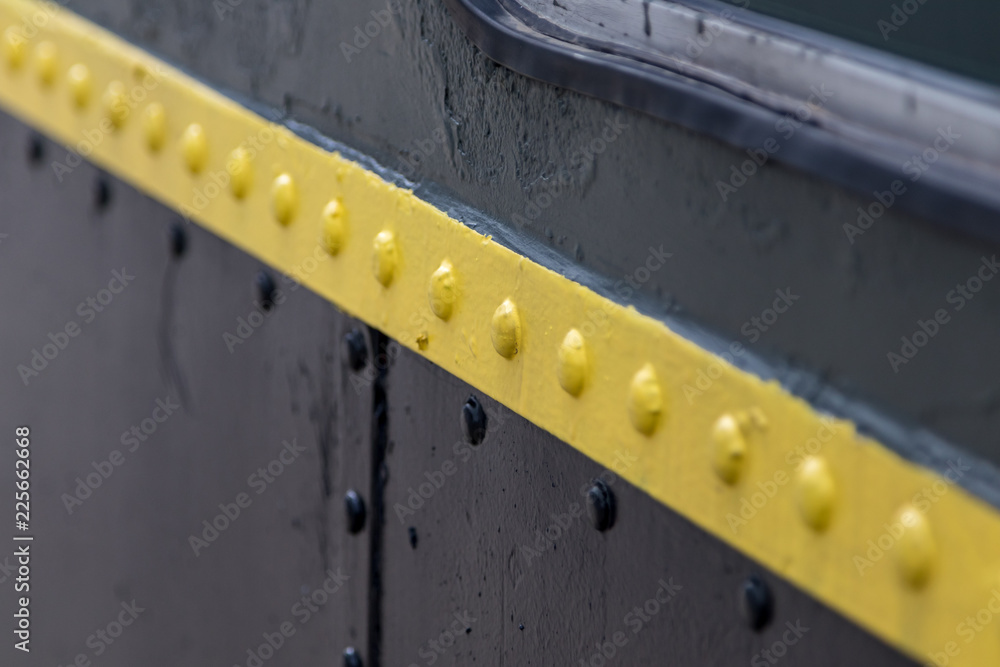 Fototapeta premium rivets on metal train wall