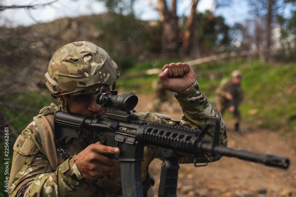 © Wavebreak Media - Military soldiers training during military training © Wavebreak Media - Military soldiers training during military training