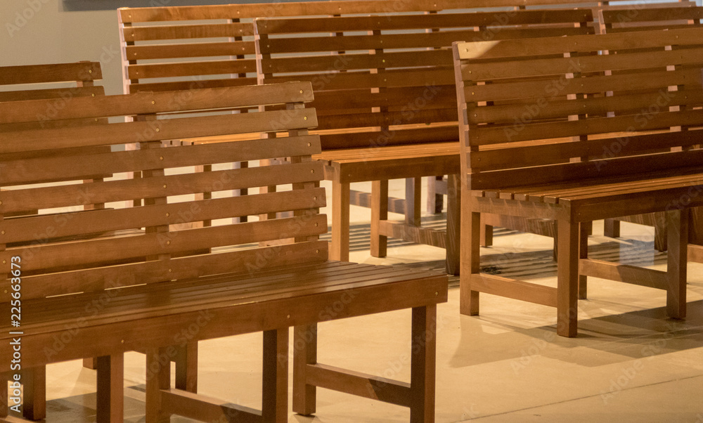 multiple empty benches plan to take over the world unless you purchase their photo today