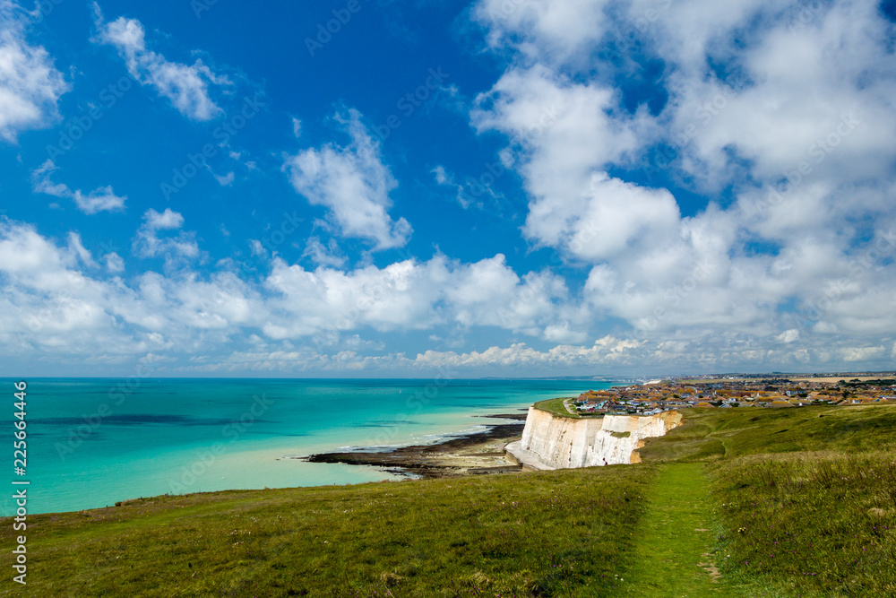 Peacehaven, Sussex UK from Newhaven heights at low tide on a sunny summer day