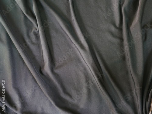 black silk fabric background,satin cloth texture © amonphan