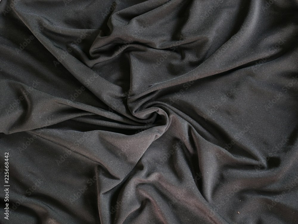 Fototapeta premium Black silk fabric texture background