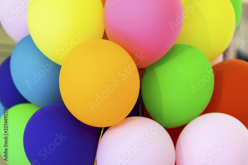 Bright multicolored balloons close-up  festive abstract background for different themes