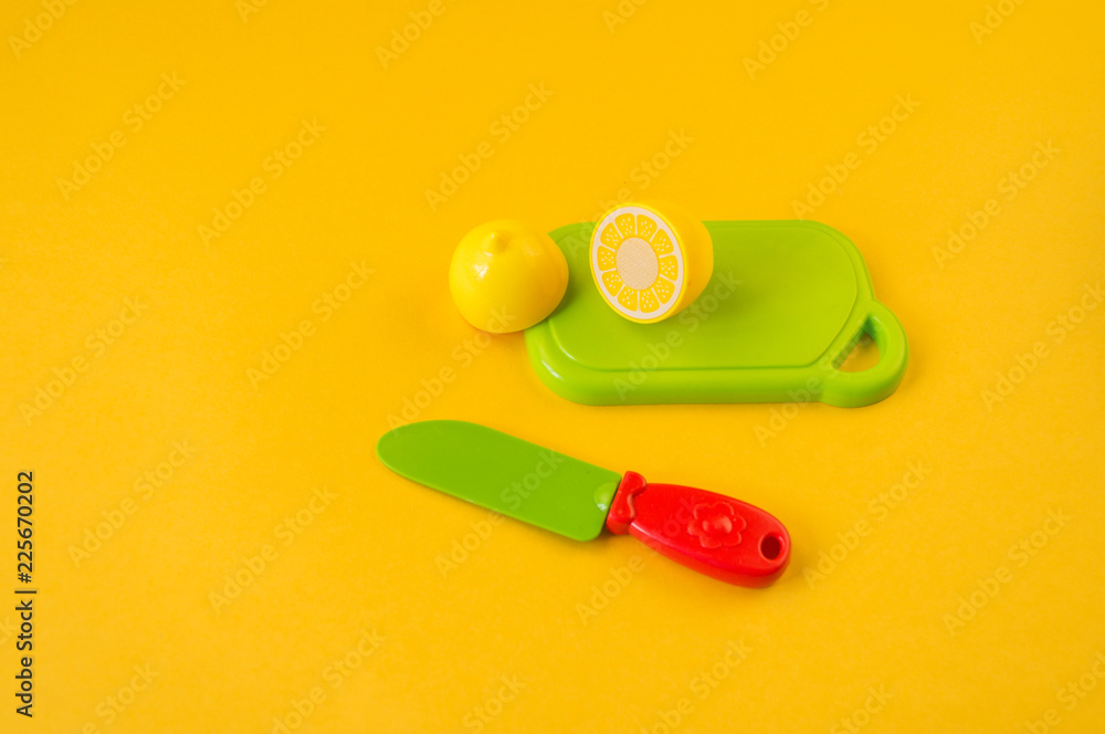 Children's toy plastic fruit in a basket Children's toy plastic fruit in a basket