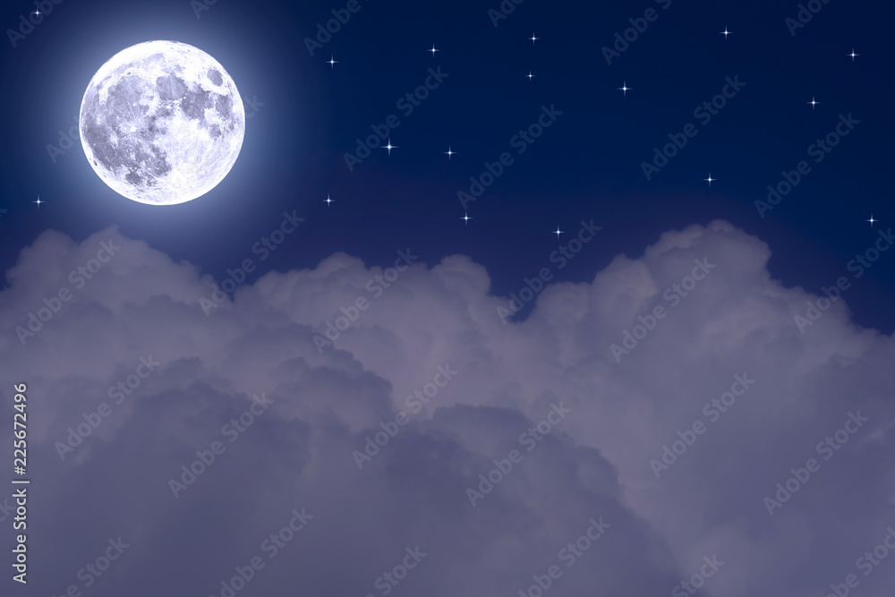 Naklejka premium The full moon between the clouds in the night sky