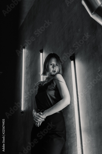 Very beautiful girl posing in a room with lamps, model business. © combo1982