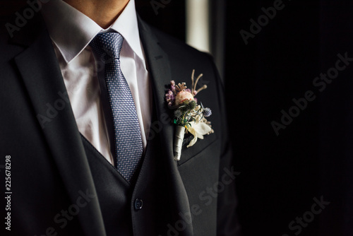 tie, shirt and jacket of the groom photo