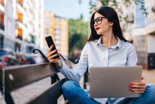 Freelancer girl outdoors