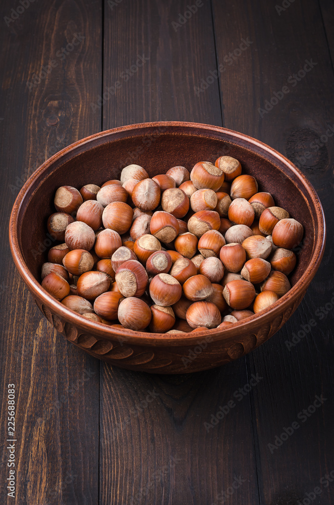 Hazelnut on a dark background. Hazelnut on a dark background.