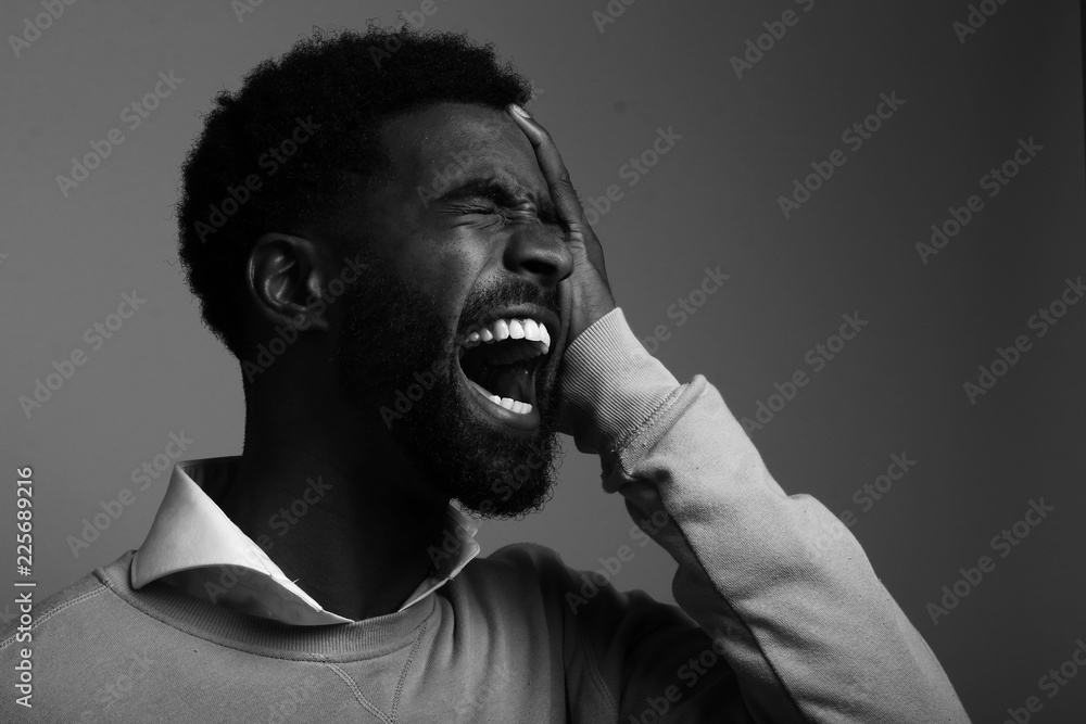 Fototapeta premium Black and white portrait of a black man