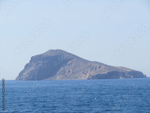 Capdolo island and waves and rocks © LovPhotography