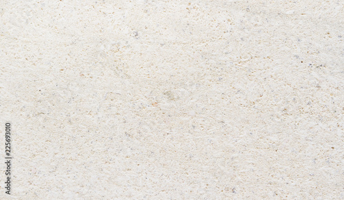 Detailed marble stone. Fragment of limestone wall, stone block background. photo