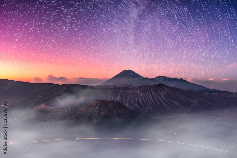 Mount active volcano, Batok, Bromo, Semeru with starry and fog at dawn