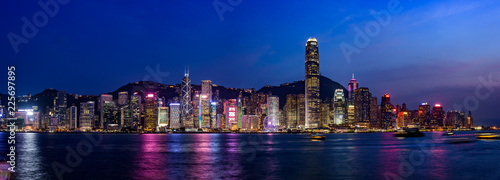 Wide panorama of Victoria Harbor night view at Hong Kong, China
