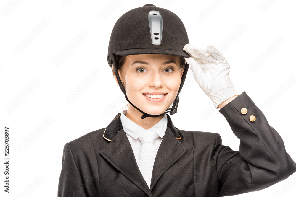 close-up portrait of smiling young horsewoman in safety helmet looking at camera isolated on white close-up portrait of smiling young horsewoman in safety helmet looking at camera isolated on white