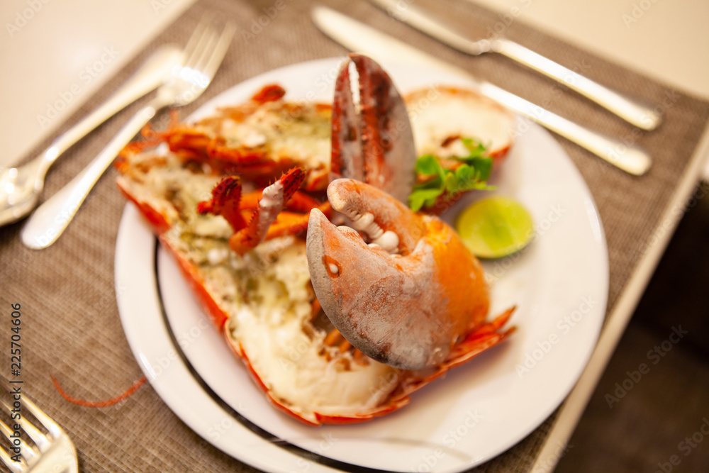 Simple yet delicious. Hot and freshly baked halved Lobster with butter. Fresh, juicy and tasty bright red Maine Lobster or American lobster. Sweet and flavorful lobster. Rich in omega-3 fatty acid Simple yet delicious. Hot and freshly baked halved Lobster with butter. Fresh, juicy and tasty bright red Maine Lobster or American lobster. Sweet and flavorful lobster. Rich in omega-3 fatty acid