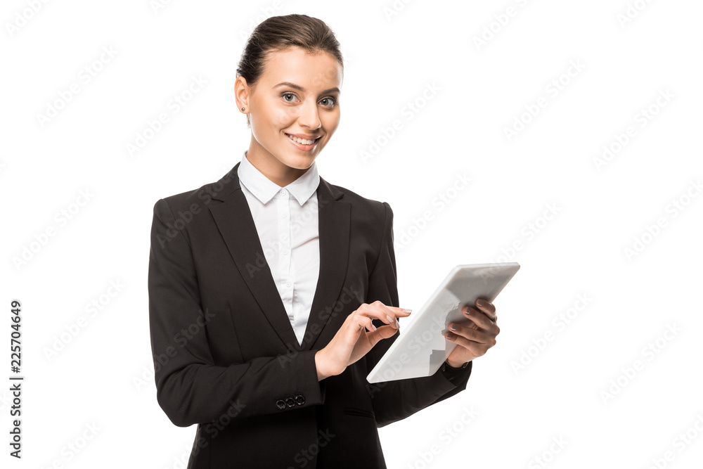 beautiful young businesswoman using tablet and looking at camera isolated on white beautiful young businesswoman using tablet and looking at camera isolated on white