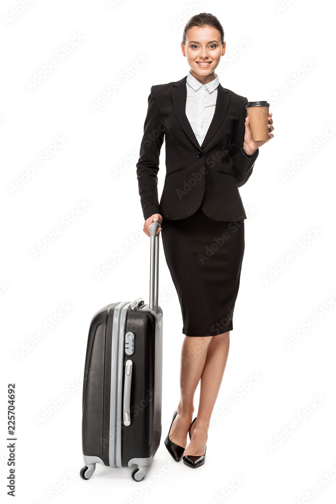 happy young businesswoman in suit with luggage and paper cup of coffee looking at camera isolated on white happy young businesswoman in suit with luggage and paper cup of coffee looking at camera isolated on white