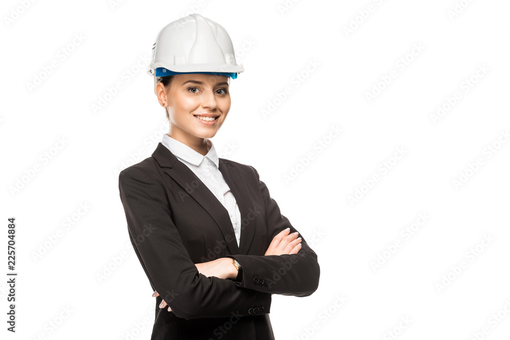 beautiful young female architect in helmet and suit looking at camera with crossed arms isolated on white beautiful young female architect in helmet and suit looking at camera with crossed arms isolated on white