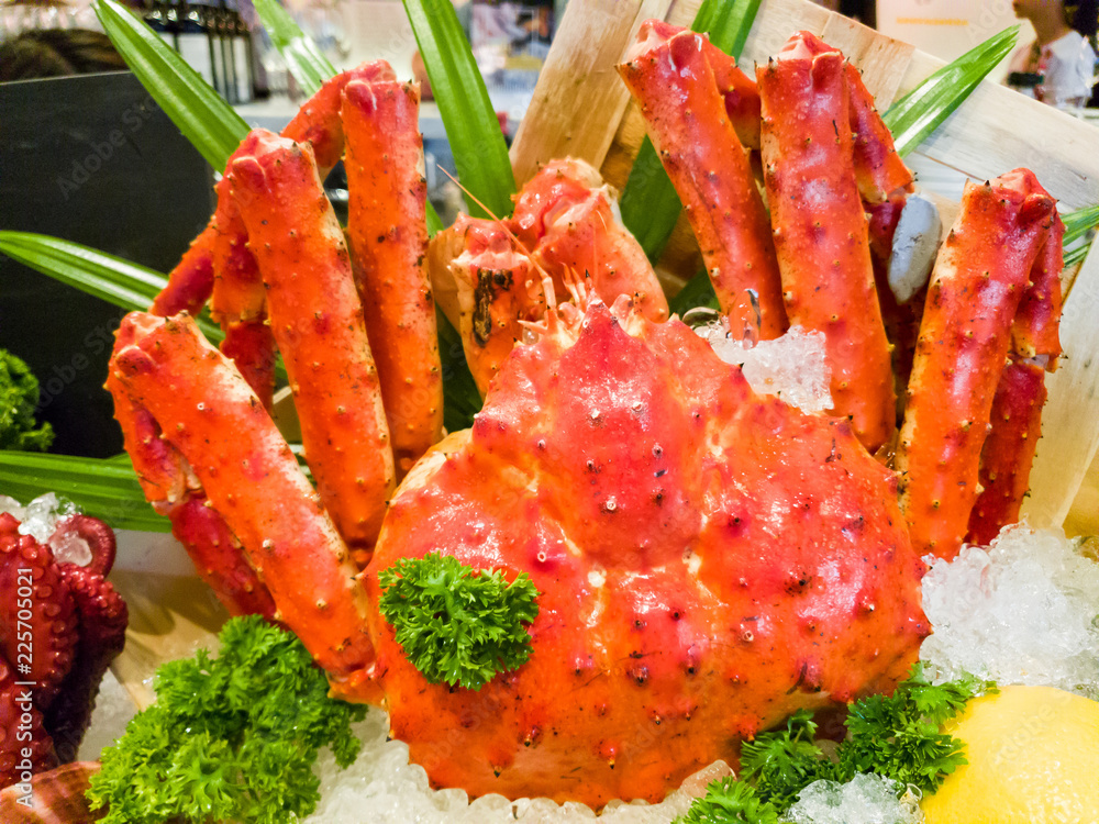 Fresh, juicy and tasty poached whole Alaskan king crab or Taraba crab in their shell on ice bed. Sweet and flavorful. Contain cholesterol, but low in saturated fat and also have omega-3 fatty acid. Fresh, juicy and tasty poached whole Alaskan king crab or Taraba crab in their shell on ice bed. Sweet and flavorful. Contain cholesterol, but low in saturated fat and also have omega-3 fatty acid.