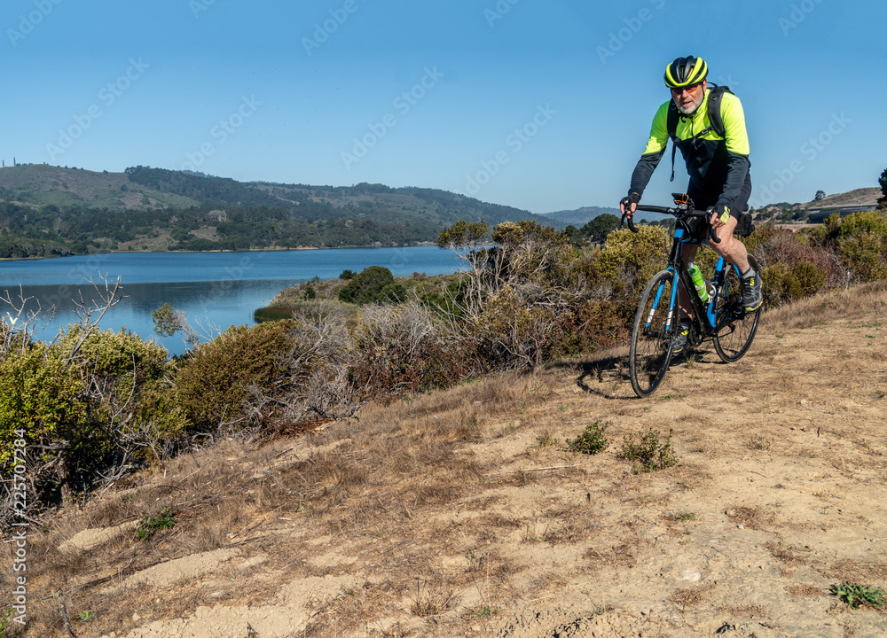 Fototapeta premium Cycling along Crystal Spring Reservoir, San Francisco Bay Area, California