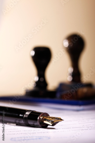 Golden pen on the contract