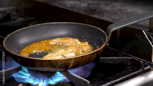 Wallpaper Mural Cook cooking foie gras on stove in kitchen. At the end he makes an open fire and the camera zooms out Torontodigital.ca