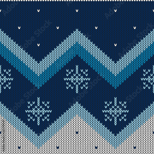 Christmas abstract knitted pattern. Christmas seamless pattern. Design for sweater, scarf, comforter or clothes texture.