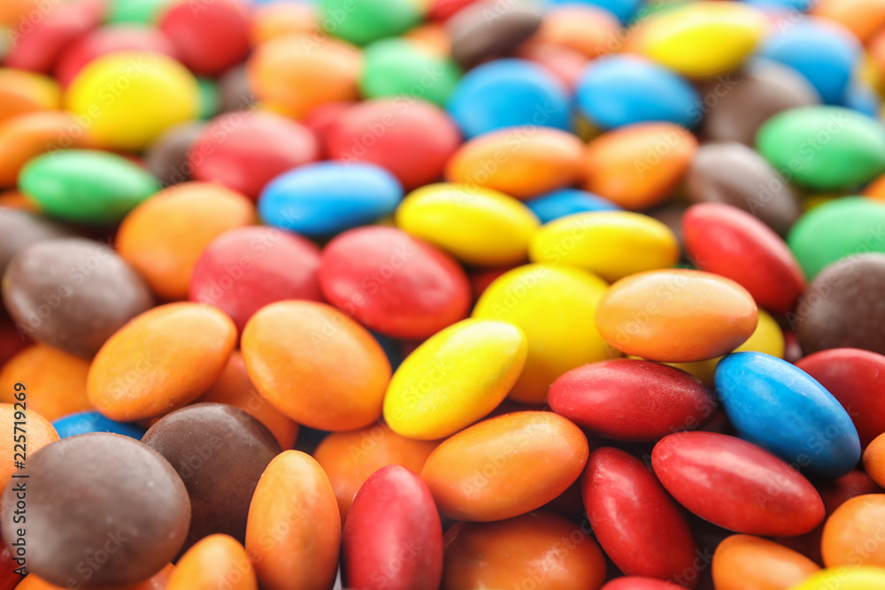 Many small colorful candies as background, closeup Many small colorful candies as background, closeup