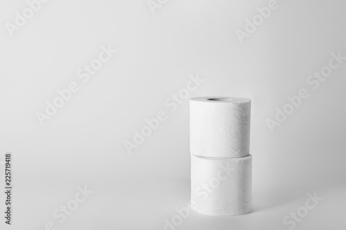Rolls of toilet paper on white background. Space for text