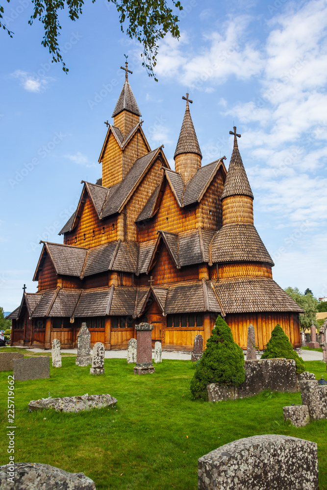 Medieval Heddal Stave Church and old rural churchyard near, Notodden, Norway