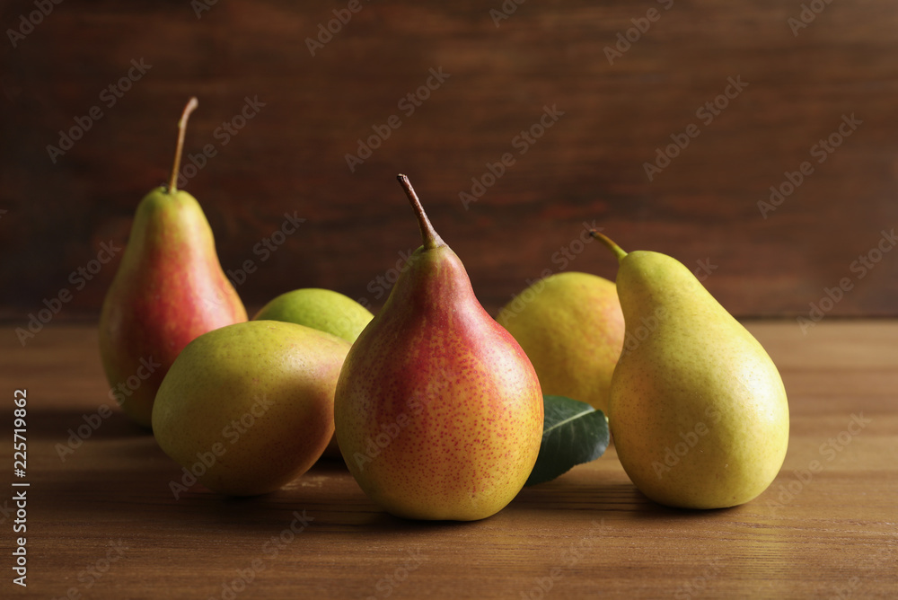 Ripe pears on wooden table. Healthy snack Ripe pears on wooden table. Healthy snack