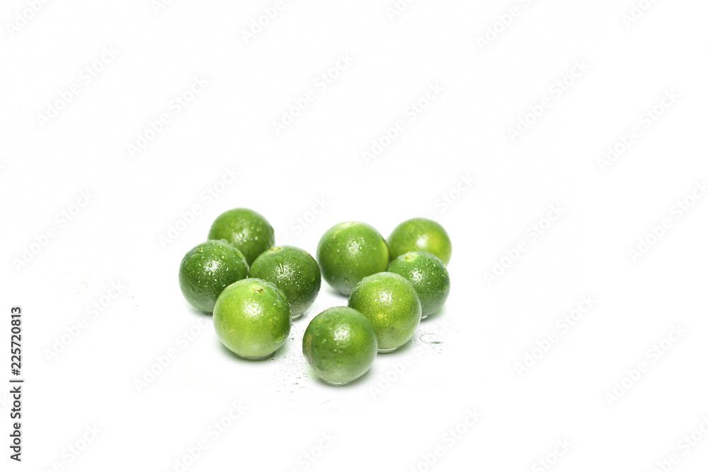 Green lemons isolated on white background Green lemons isolated on white background