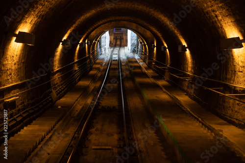 The Dark underground metro line - Train Tunnel.
fragment of a underground tunnel