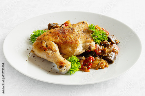 chicken tabaka with vegetable saute