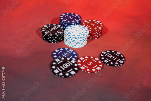 Casino abstract photo. Poker game on red background. photo