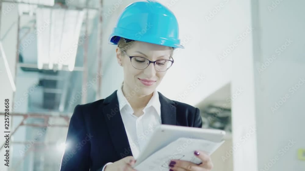 Female engineer in hardhat