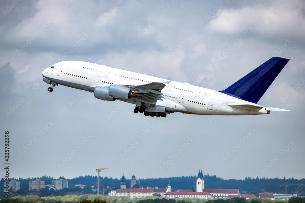 Big aeroplane is taking-off over city. Big aeroplane is taking-off over city.