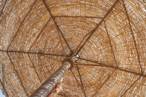 Beach umbrella parasol on the beach of Read Sea Hurghada all inclusive photo